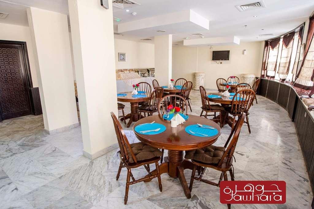 Al Jawhara Metro Hotel Дубай Ресторант снимка